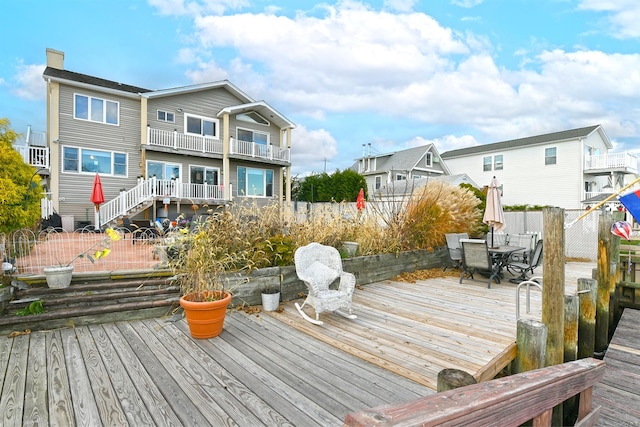 wooden terrace with a patio