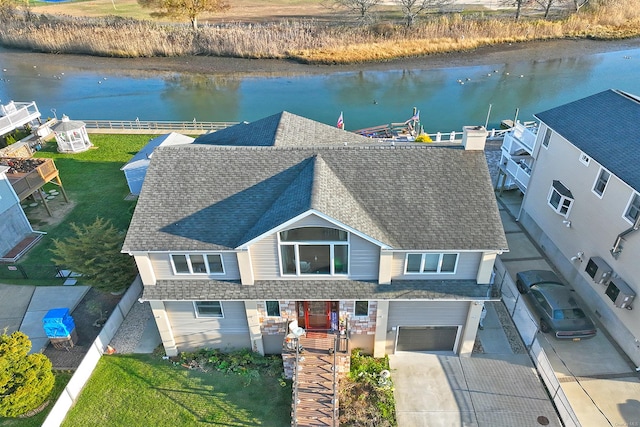 drone / aerial view with a water view