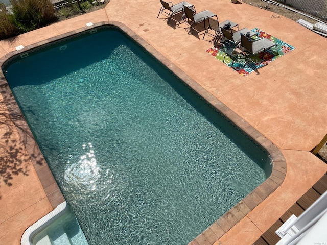 view of pool with a patio area