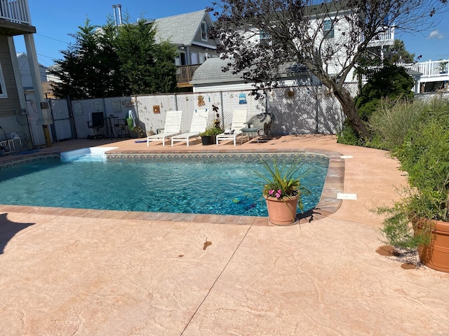 view of pool featuring a patio