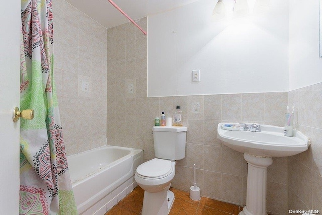 bathroom with shower / bathtub combination with curtain, tile walls, and toilet