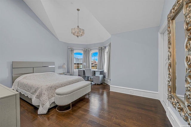 bedroom featuring dark wood-type flooring, vaulted ceiling, and a notable chandelier