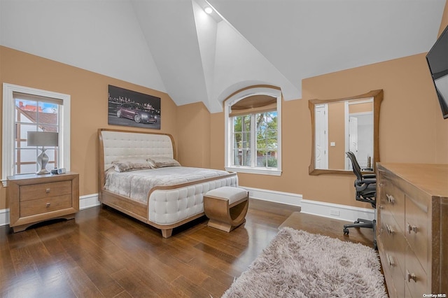 bedroom with multiple windows, high vaulted ceiling, and dark wood-type flooring