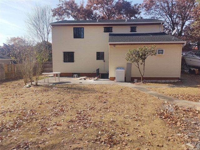 back of property with a patio area