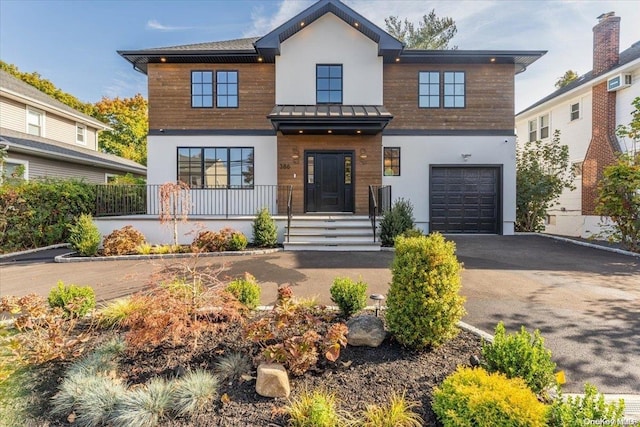 modern home featuring a garage