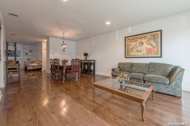 living room featuring wood-type flooring