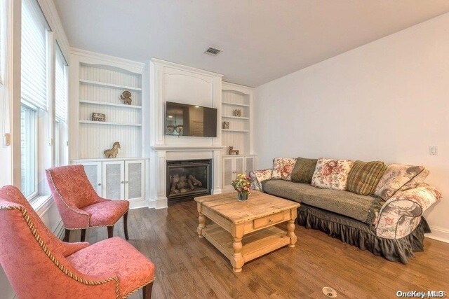 living room featuring dark hardwood / wood-style floors