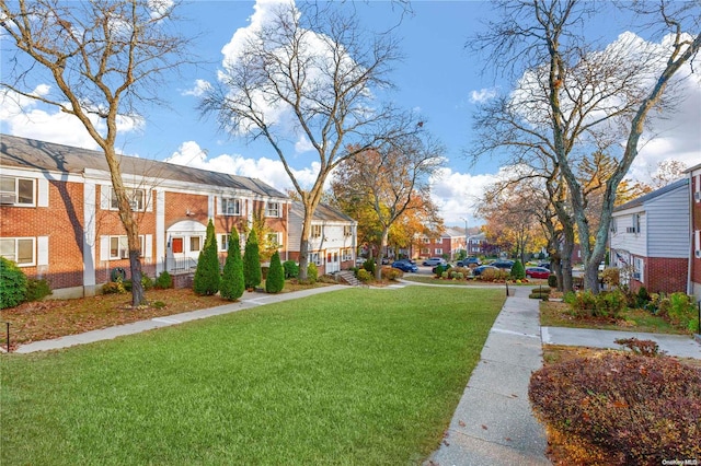 view of community with a lawn