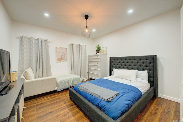 bedroom featuring dark hardwood / wood-style floors