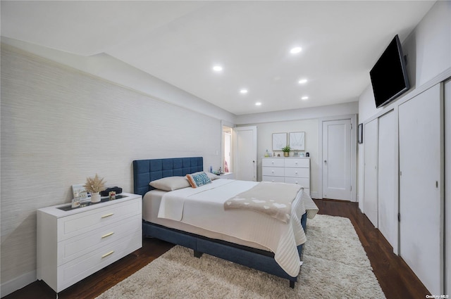 bedroom featuring dark hardwood / wood-style floors