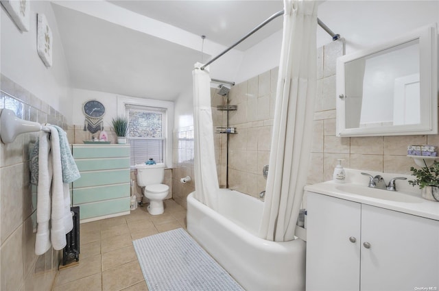 full bathroom featuring toilet, tile walls, vanity, shower / bathtub combination with curtain, and tile patterned flooring