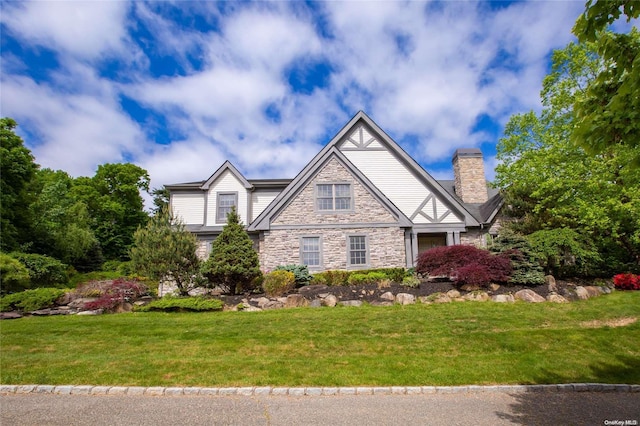 view of front of home with a front yard