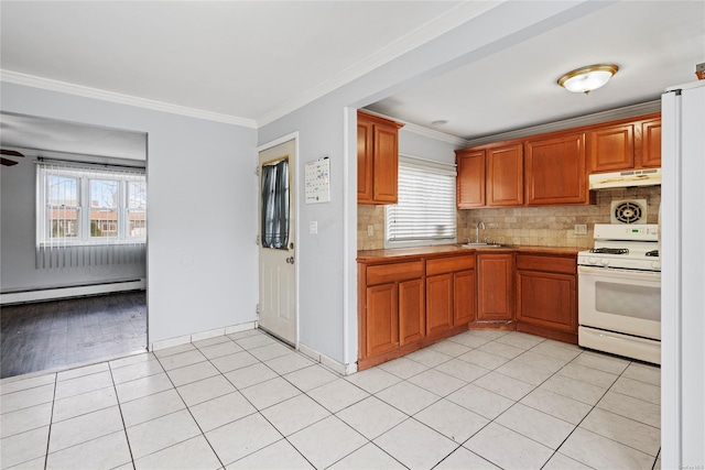 kitchen with ornamental molding, white range oven, plenty of natural light, and a baseboard heating unit