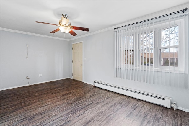 empty room with ceiling fan, dark hardwood / wood-style flooring, crown molding, and a baseboard heating unit