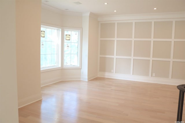 unfurnished room with light hardwood / wood-style floors