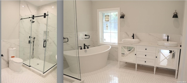 bathroom featuring plenty of natural light, sink, and tile walls