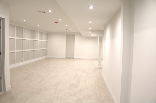 unfurnished room featuring light hardwood / wood-style flooring