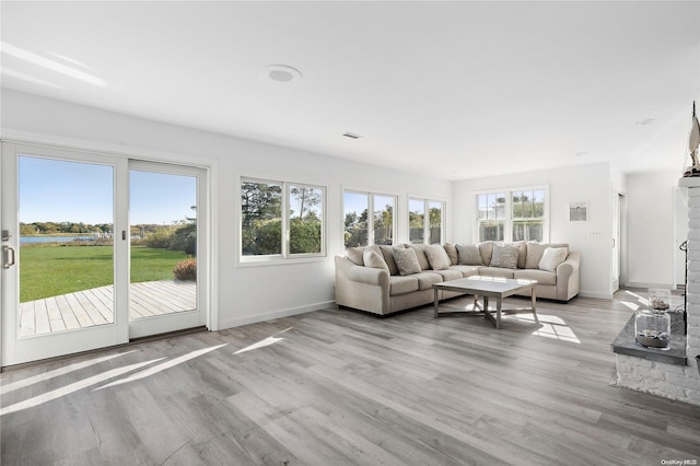 unfurnished living room with light hardwood / wood-style floors