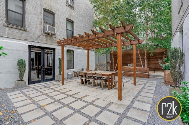 view of patio / terrace with a pergola and french doors