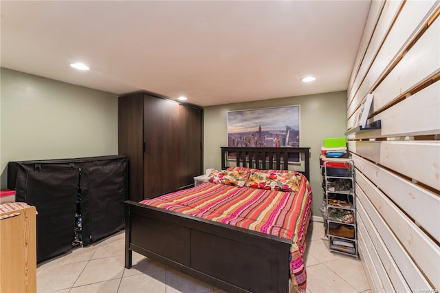 bedroom featuring light tile patterned flooring