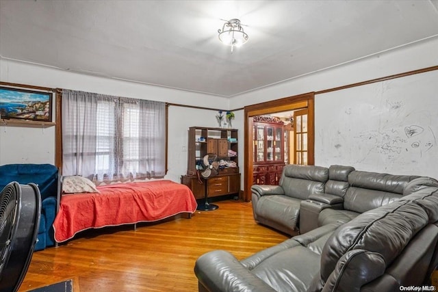 bedroom with wood-type flooring