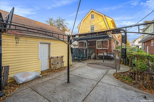 back of house featuring a patio