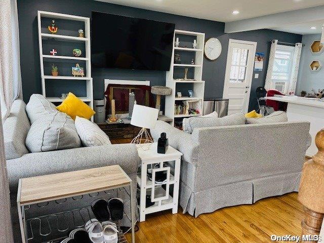 living room with hardwood / wood-style flooring