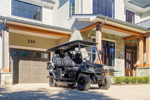 entrance to property with stone siding