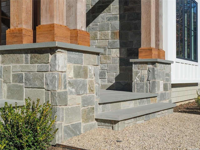 exterior details featuring stone siding