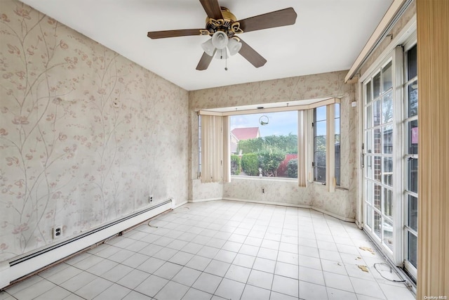 spare room featuring ceiling fan, light tile patterned floors, and a baseboard radiator