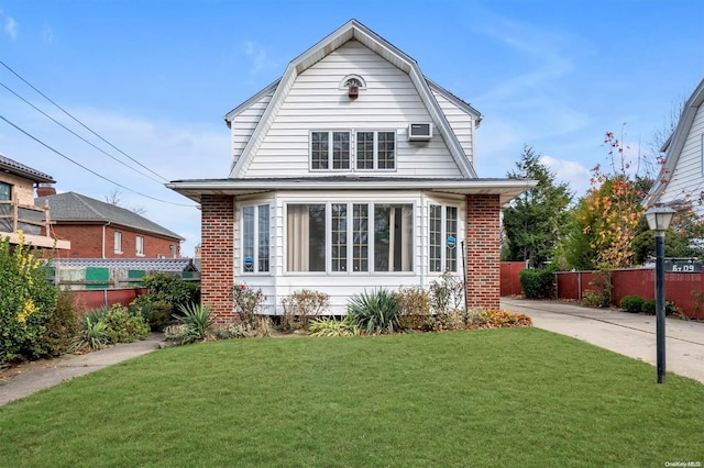 view of front facade with a front yard