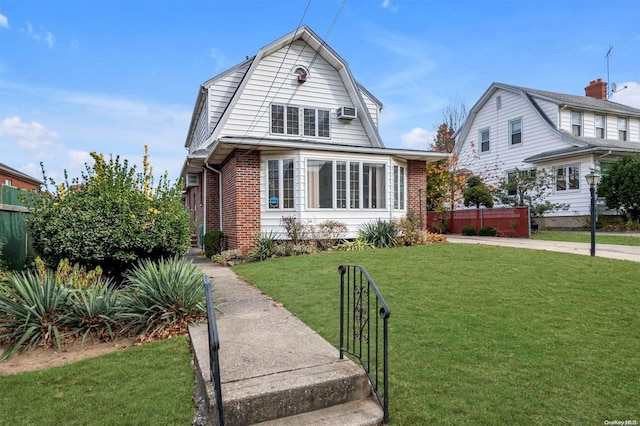 view of front property featuring a front lawn