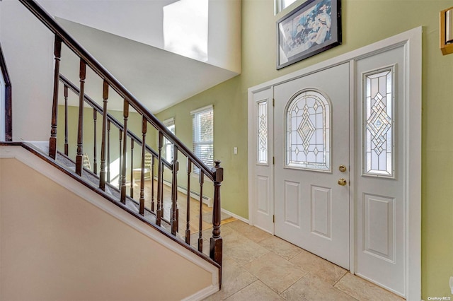 foyer with light tile patterned floors