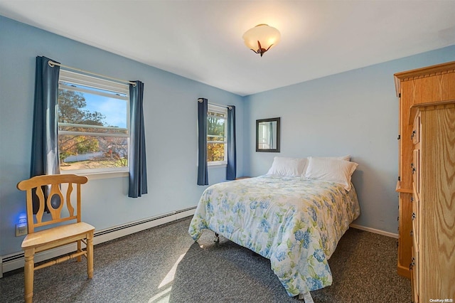 carpeted bedroom featuring baseboard heating