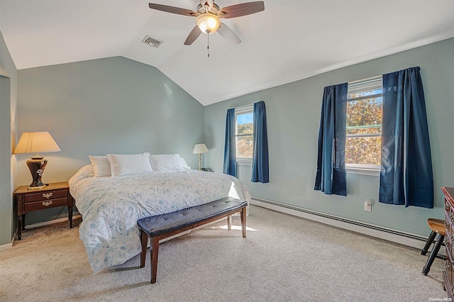 bedroom featuring light colored carpet, vaulted ceiling, ceiling fan, and a baseboard heating unit