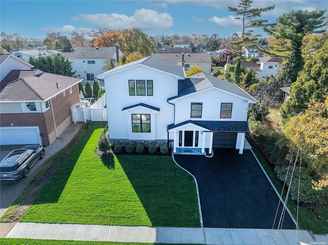 1956 Leonard Ln, Merrick, NY 11566 - view of front of property with driveway, a residential view, and an attached garage