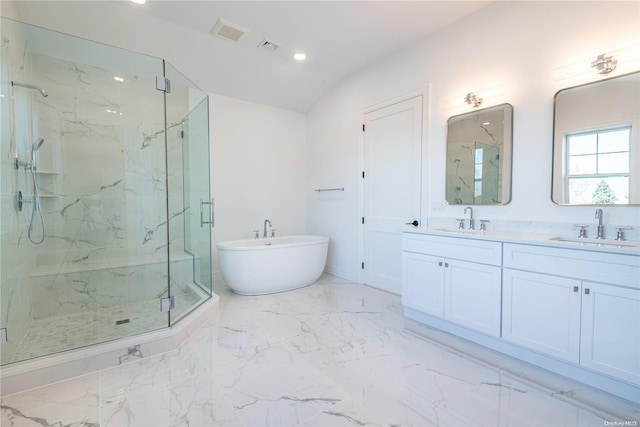 1956 Leonard Ln, Merrick, NY 11566 - bathroom featuring a marble finish shower, a freestanding bath, recessed lighting, double vanity, and vaulted ceiling
