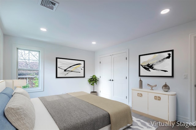 1956 Leonard Ln, Merrick, NY 11566 - bedroom with recessed lighting, a closet, and baseboards