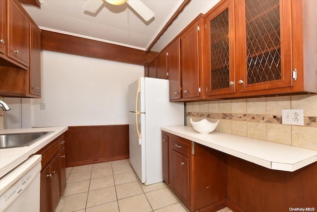 kitchen featuring backsplash, white appliances, ceiling fan, sink, and light tile patterned floors