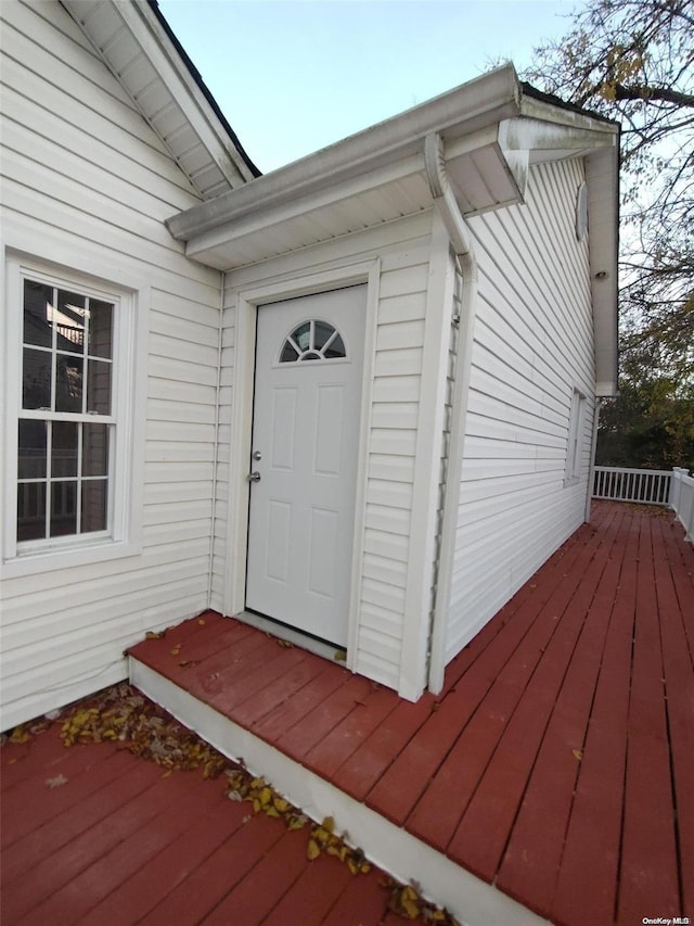 entrance to property with a deck