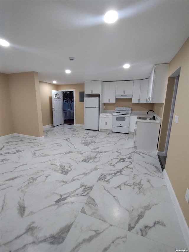 kitchen featuring white cabinets, white appliances, and sink