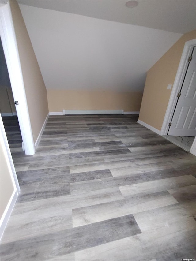 interior details featuring hardwood / wood-style flooring and baseboard heating