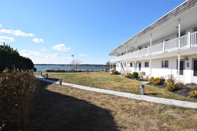 50 Rampasture Rd Unit 6, Hampton Bays, NY 11946 - view of green lawn with a water view