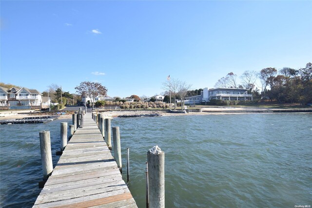 50 Rampasture Rd Unit 6, Hampton Bays, NY 11946 - dock featuring a water view