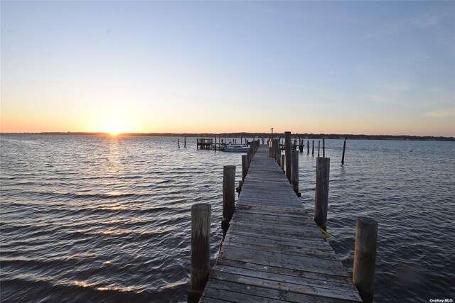 50 Rampasture Rd Unit 6, Hampton Bays, NY 11946 - dock area featuring a water view