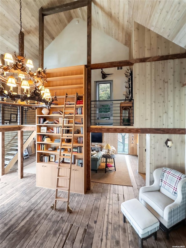 4170/3375 Indian Neck Ln, Peconic, NY 11958 - interior space featuring hardwood / wood-style floors, an inviting chandelier, high vaulted ceiling, and wooden ceiling