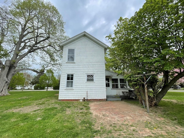 2055 Boisseau Ave, Southold, NY 11971 - rear view of property with a lawn
