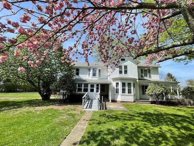 2055 Boisseau Ave, Southold, NY 11971 - back of house with a yard