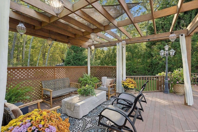 wooden deck with outdoor lounge area and a pergola