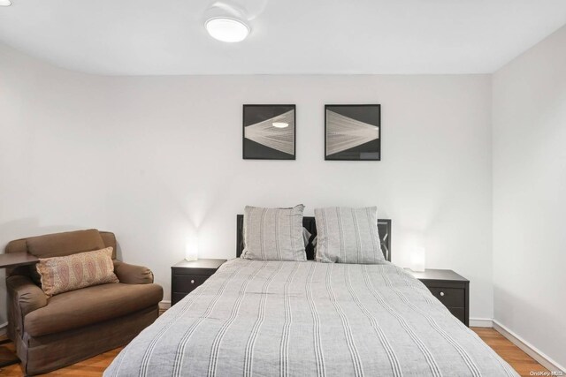 bedroom featuring light wood-type flooring